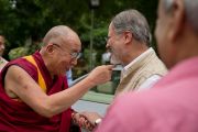 Заместитель ректора исламского университета Джамия Миллия Наджиб Джунг встречает Его Святейшество Далай-ламу. Дели, Индия. 12 сентября 2012 г. Фото: Тензин Чойджор (Офис ЕСДЛ)