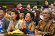 Монгольские буддисты на встрече с Его Святейшеством Далай-ламой в первый день его учений в университете Шова. Токио, Япония. 12 апреля 2015 г. Фото: Тензин Джигме